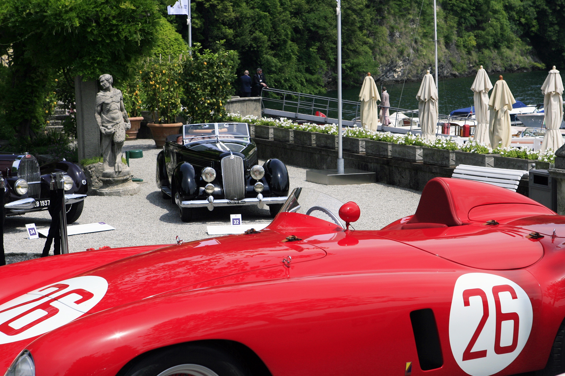 Saturday view from 750 Monza to a Lancia Astura Serie III