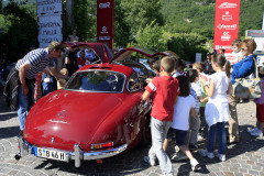 Mille Miglia Moods, kids at the entrance of the Mille Miglia Museum get a treat