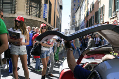 Mille MIglia Moods; handing out the 1000 Milgia newspaper Italian style