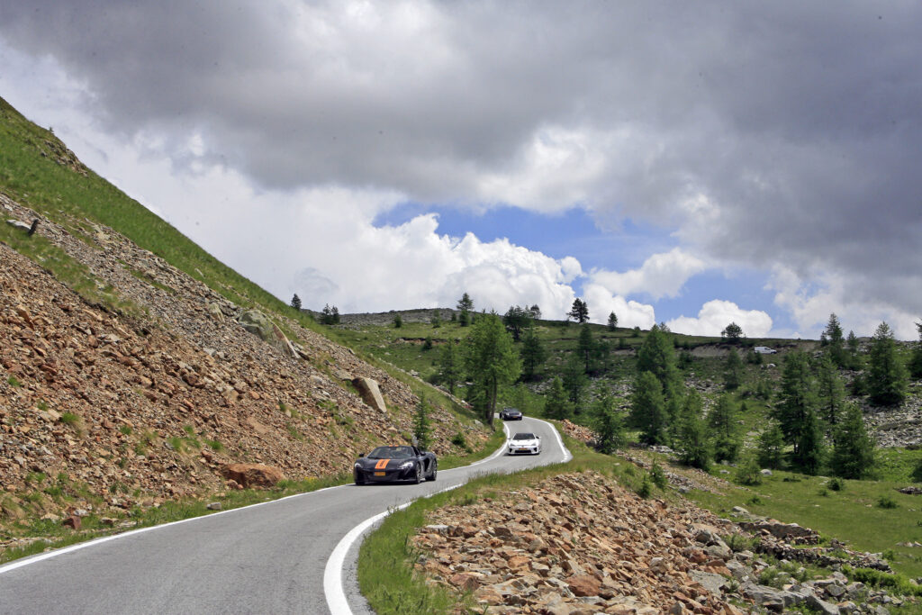 Our must drives list to add to Route des Grandes Alpes. A must-drive to add to the Route des Grandes Alpes. Tackling this pass feels like entering new territory, a pure driving arena where every curve is as beautifull as the landscape around. Here at out ensational Heights, Lunar Landscapes & Unforgetable Resorts Tour with a McLaren 650S
