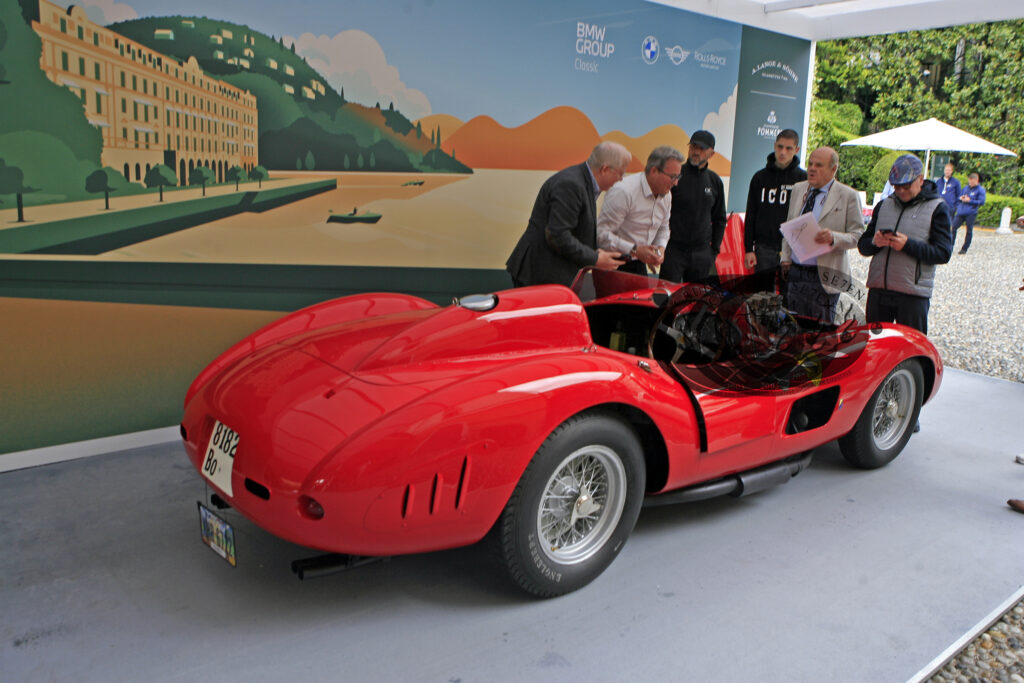 A 1957 Ferrari 335 S detailed inspection before an critical evaluation of classic and vintage cars by a panel of expert judges to determine their originality, historical significance, and design, ultimately deciding the winners of the prestigious competition. Class D AND the Trofeo dei Presidenti, AND runner up for Best of Show. Not to mention a Cuba Grand Prix-winner, courtesy of the great Stirling Moss.